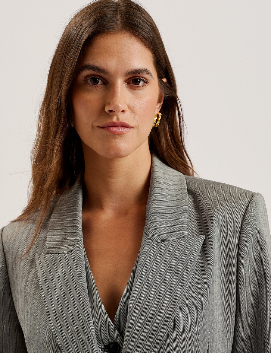 koa - oversized blazer met visgraatmotief en enkele rij knopen