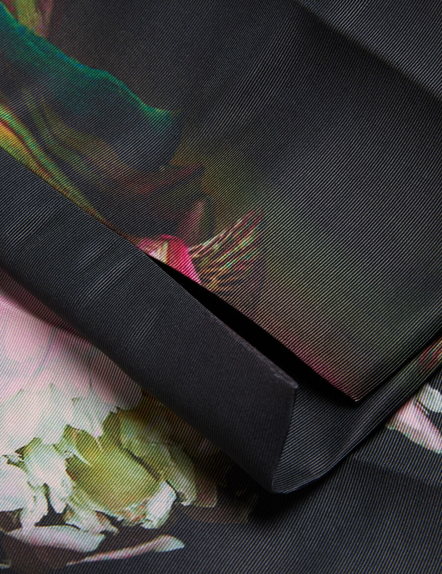 okunit - getailleerde broek met taps toelopende pijpen en bloemenprint