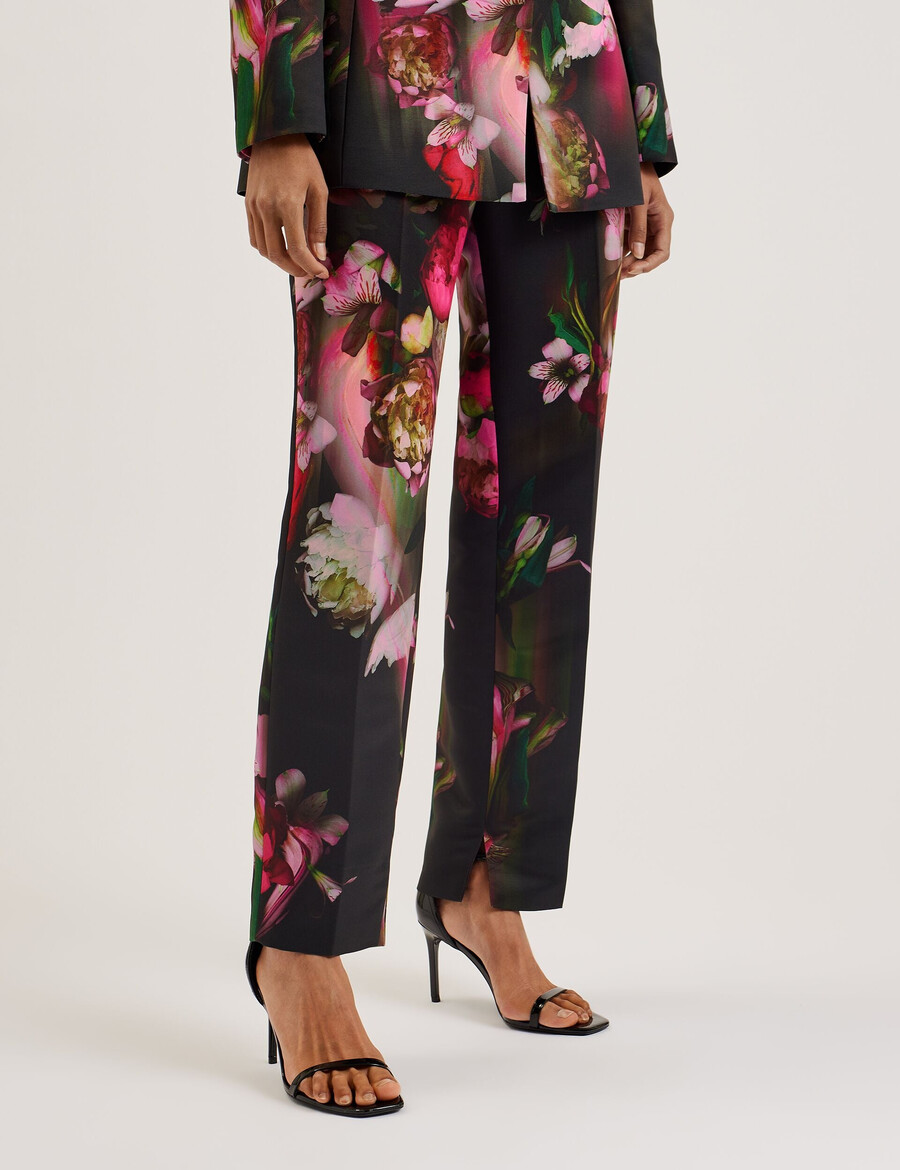 okunit - getailleerde broek met taps toelopende pijpen en bloemenprint