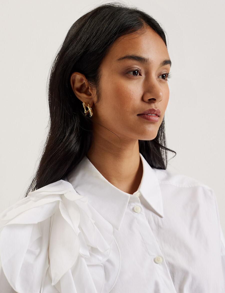 allai - oversized katoenen overhemd met corsage-detail