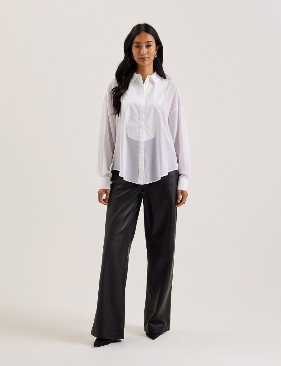 lechosa - blouse met lange mouwen en borststuk doorschijnend.