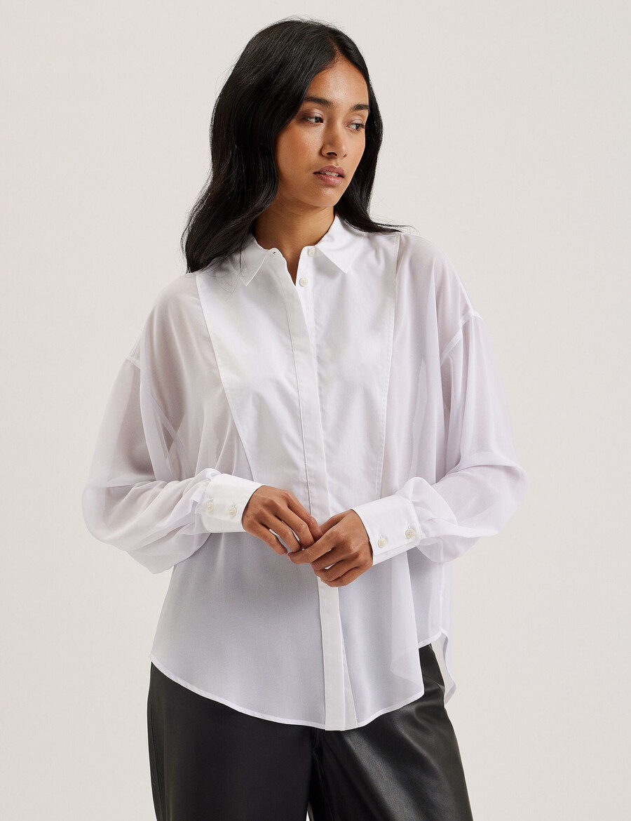 lechosa - blouse met lange mouwen en borststuk doorschijnend.