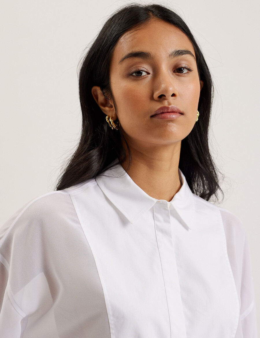 lechosa - blouse met lange mouwen en borststuk doorschijnend.