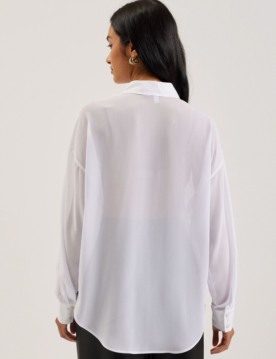 lechosa - blouse met lange mouwen en borststuk doorschijnend.
