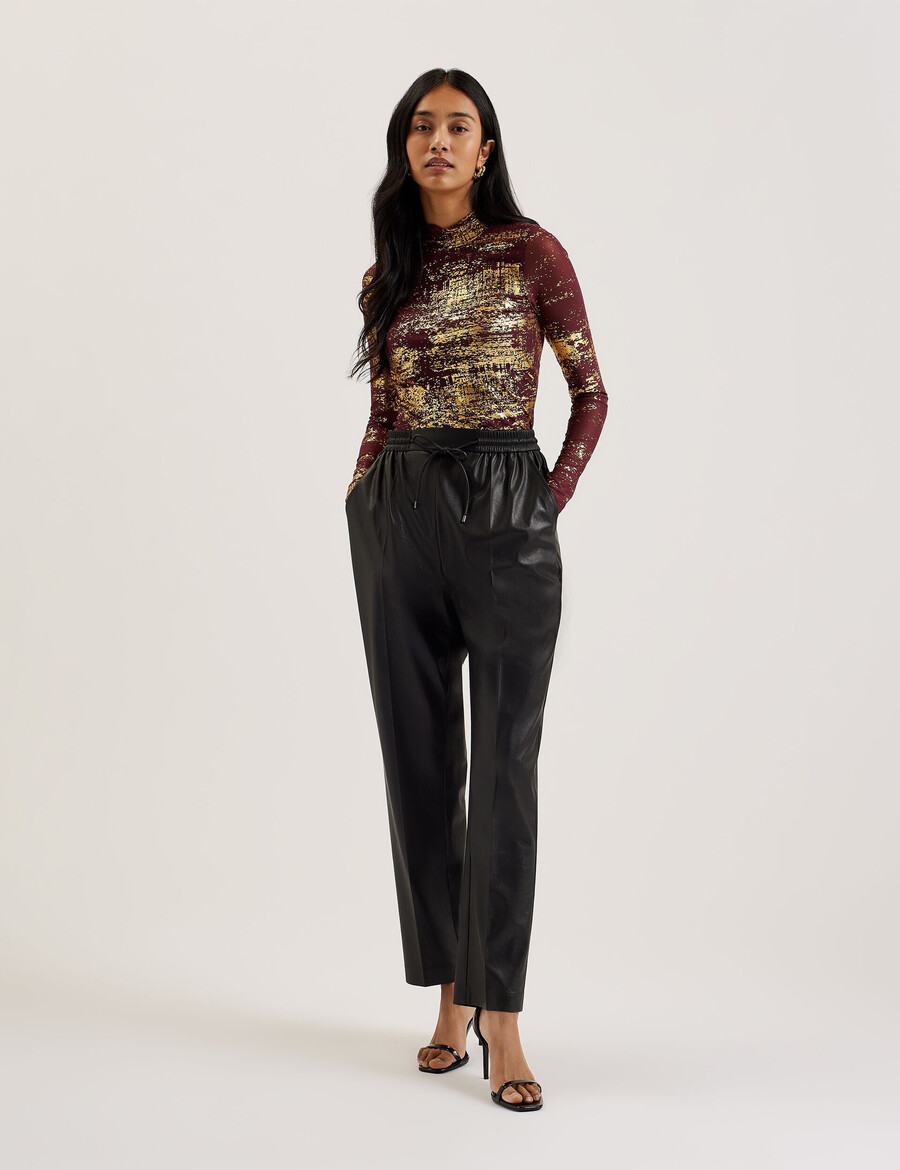 sofiy - mesh top met hoge hals en folieprint